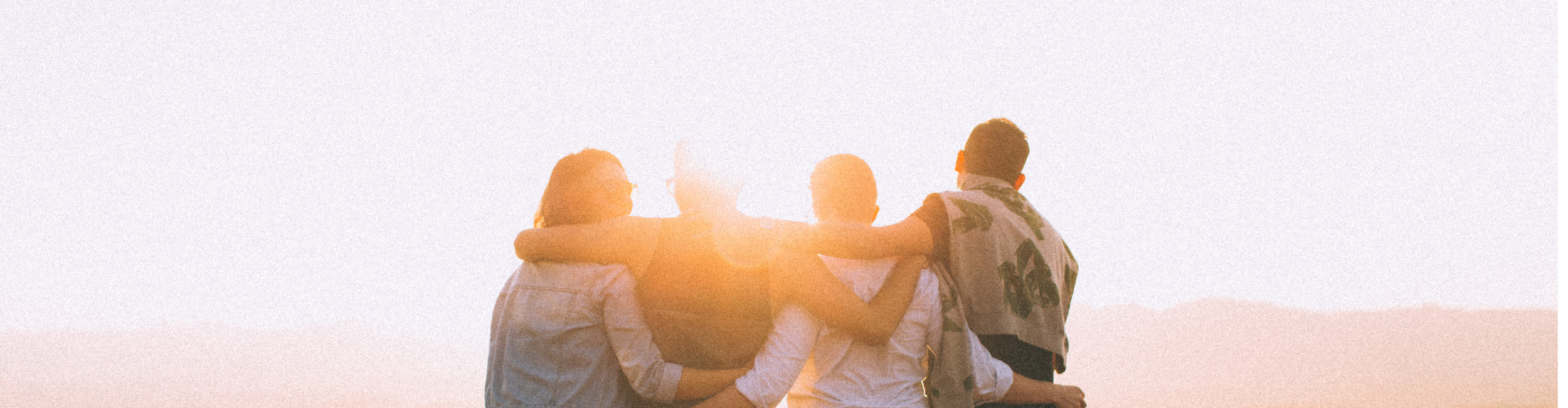 Friends together at sunset
