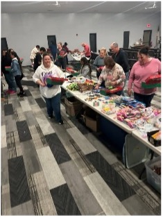 A display of 300 packed Operation Christmas Child shoeboxes